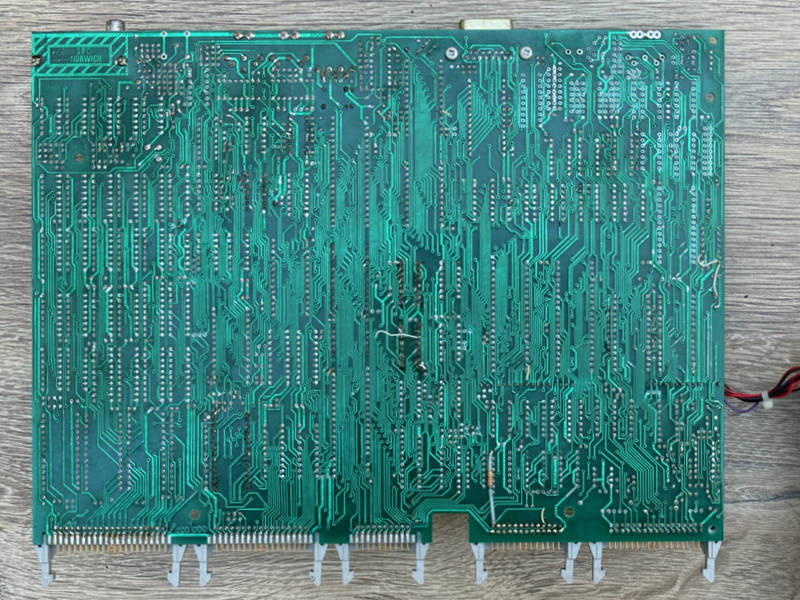 Solder side shows more patch wires and some repairs