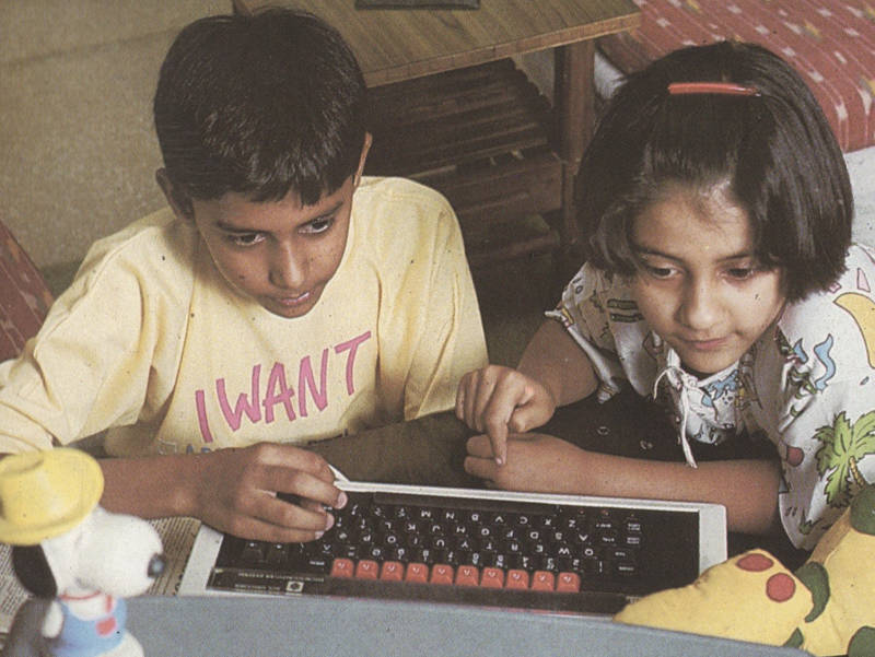 Children using undisclosed software on the Status configuration — this gives the clearest view of the logo on the function key strip